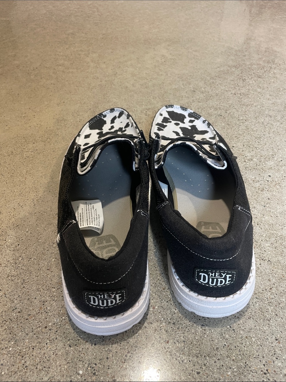 Hey Dude Women’s Slip-On Loafers in Black & White Cow Print - Picture 2 of 3